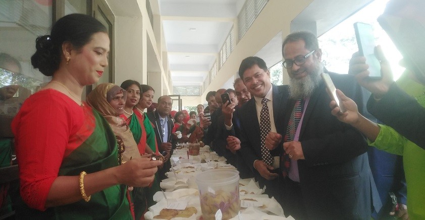 সাপাহারে ন্যাশনাল লাইফ ইনস্যুরেন্স জনবীমী'র পিঠা ও আনন্দ উৎসব